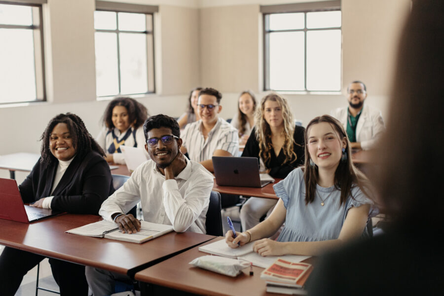 students sitting at desks in a classroom