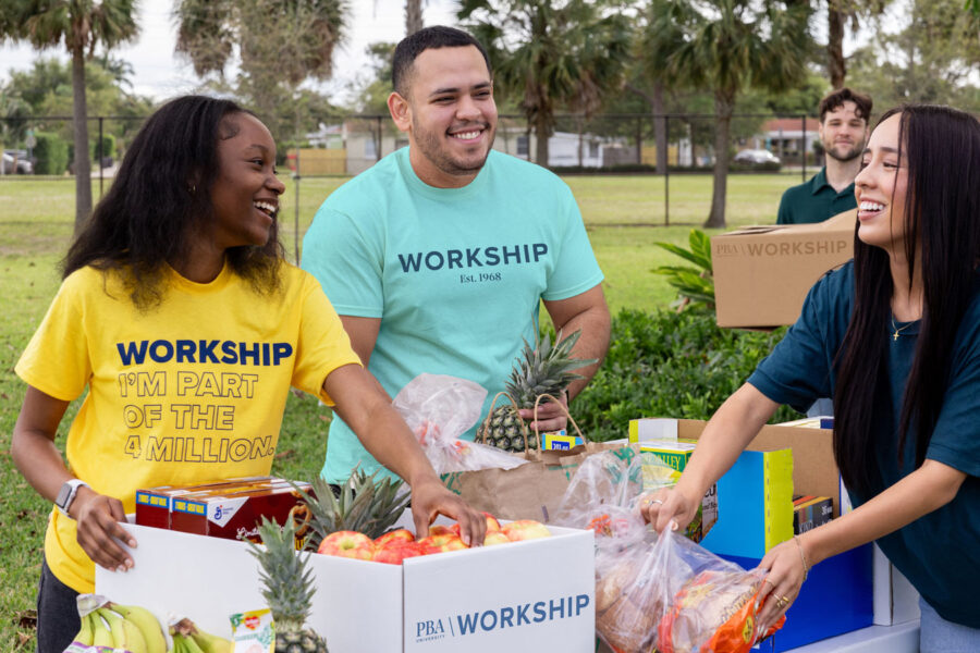 Workship volunteers sort food.
