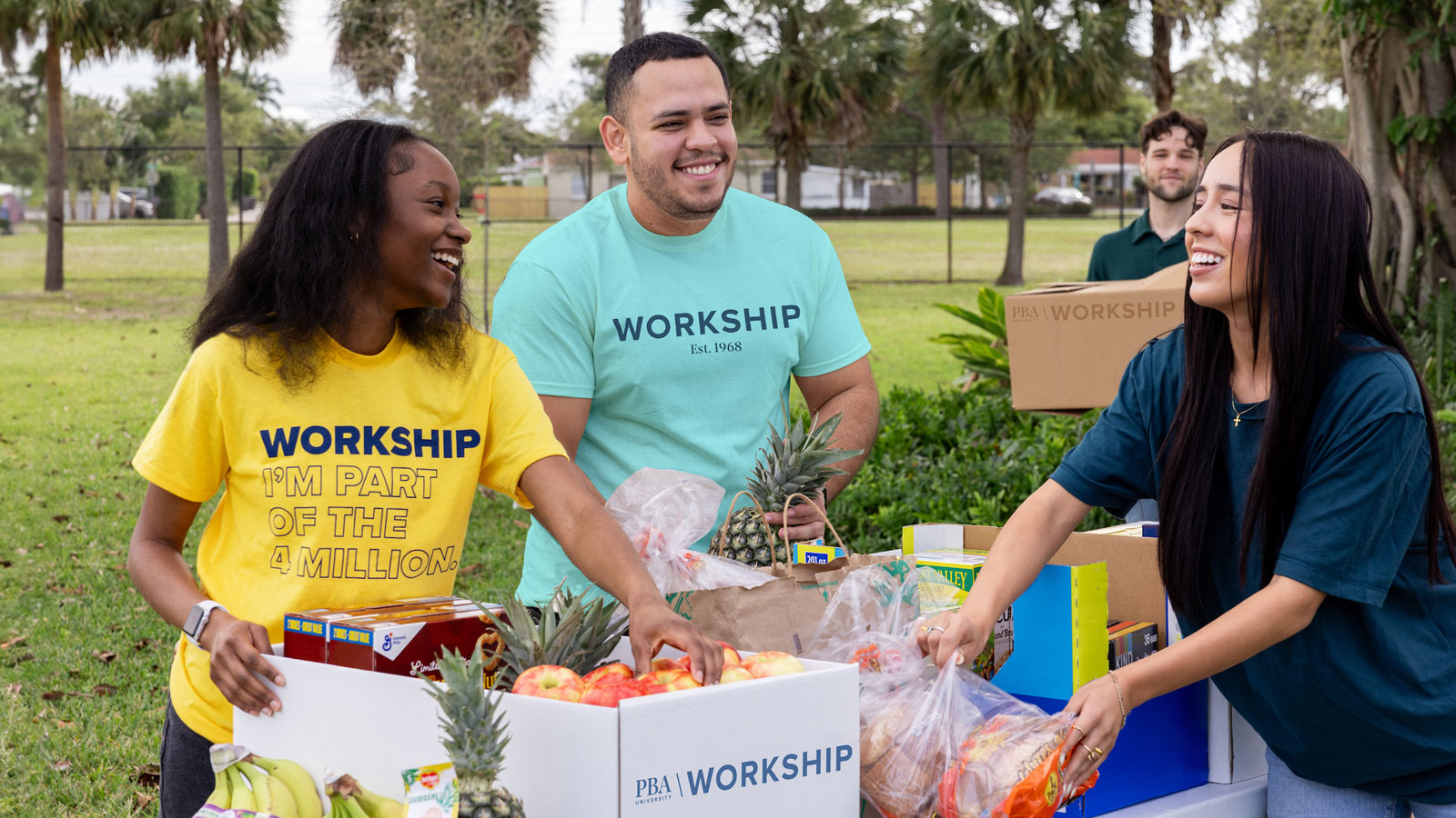 Workship volunteers sort food.