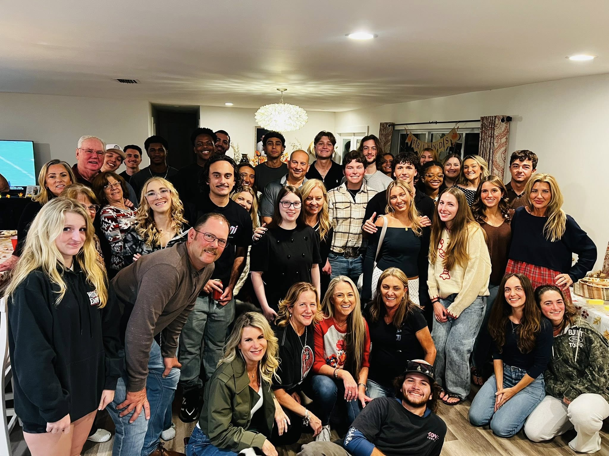 Palm Beach Atlantic University students and parents' council members gather to celebrate the holiday.