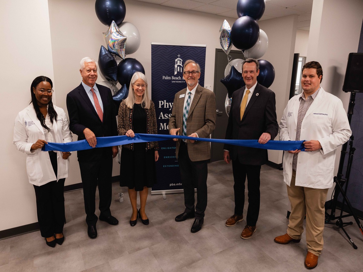 PBA executives cut the ribbon for PA program's new classroom space.