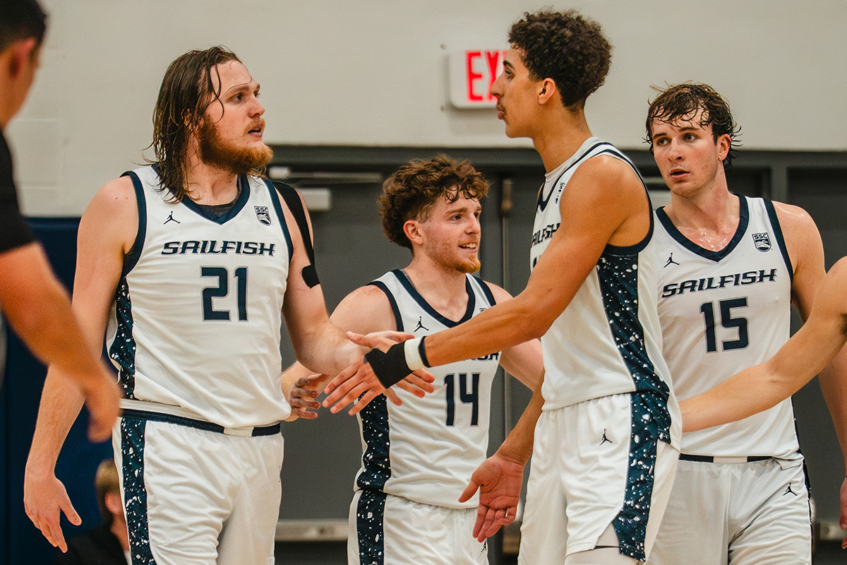 PBA basketball players celebrating on the court.
