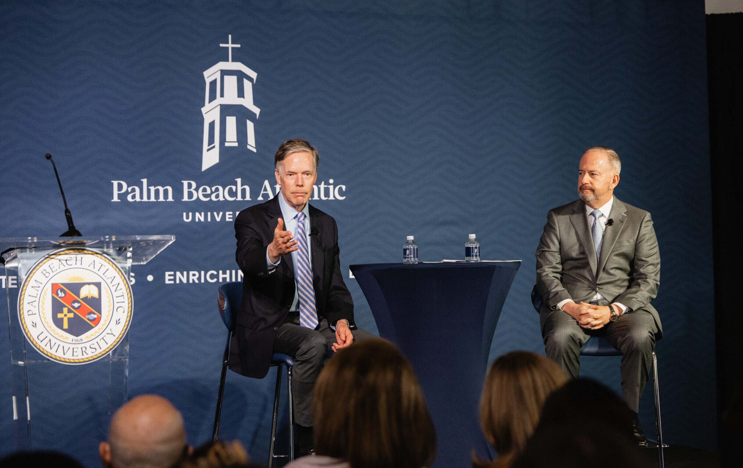 Former U.S. Ambassador Nicholas Burns (left) and Senator George LeMieux (right) at Palm Beach Atlantic University’s LeMieux Speaker Series on Iran, China, and international diplomacy.