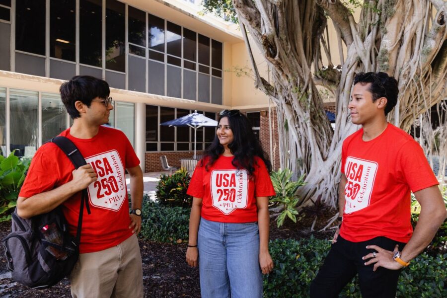 Three Palm Beach Atlantic University students sport limited edition t-shirts celebrating the nation's 250th anniversary.