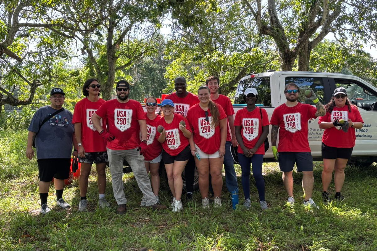 Palm Beach Atlantic University glean mangoes to serve the local community.